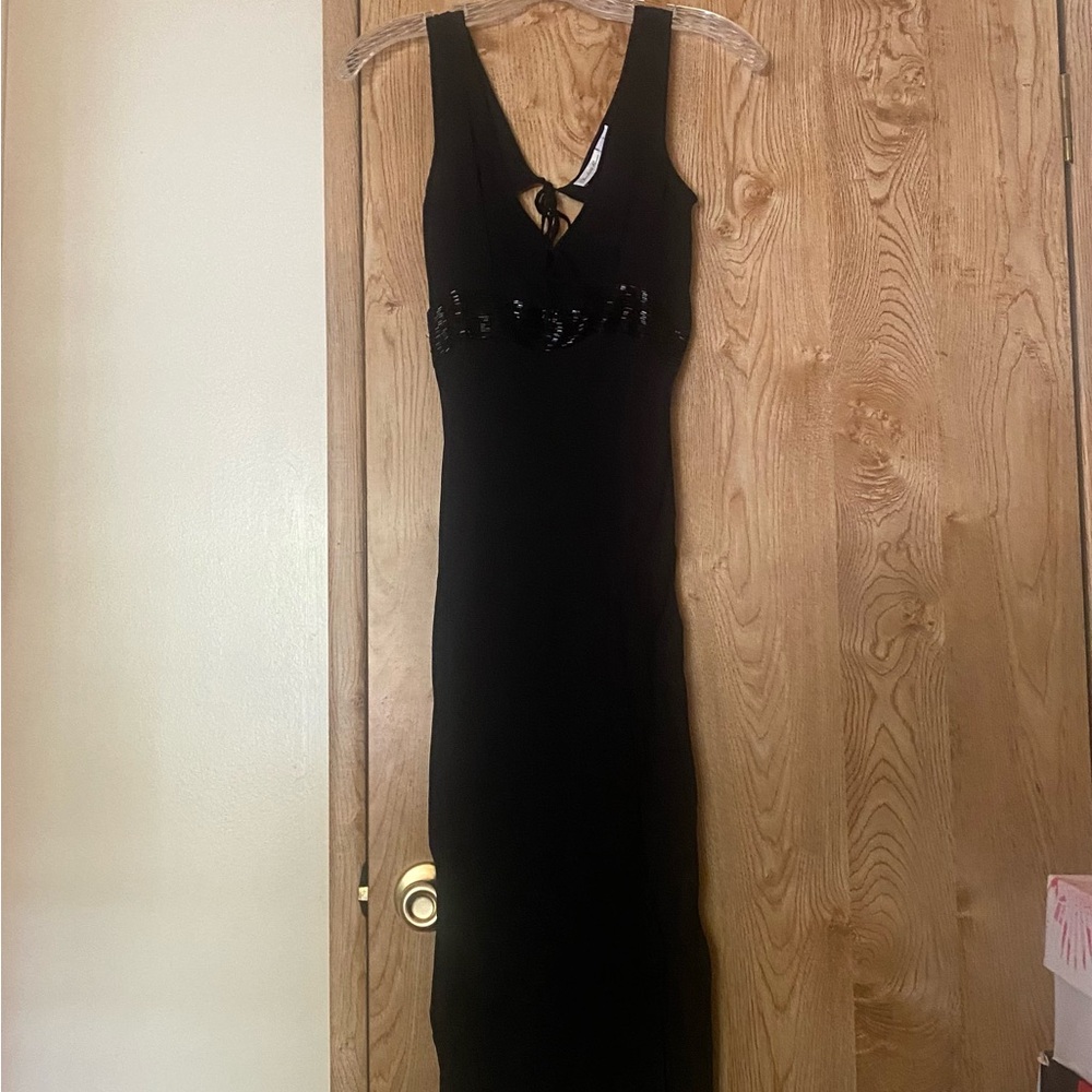 Elegant Black mid length Dress by Charlotte Russe. Rayon and beading